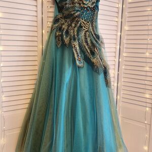 Elegant Teal Gown with Peacock Embellishments